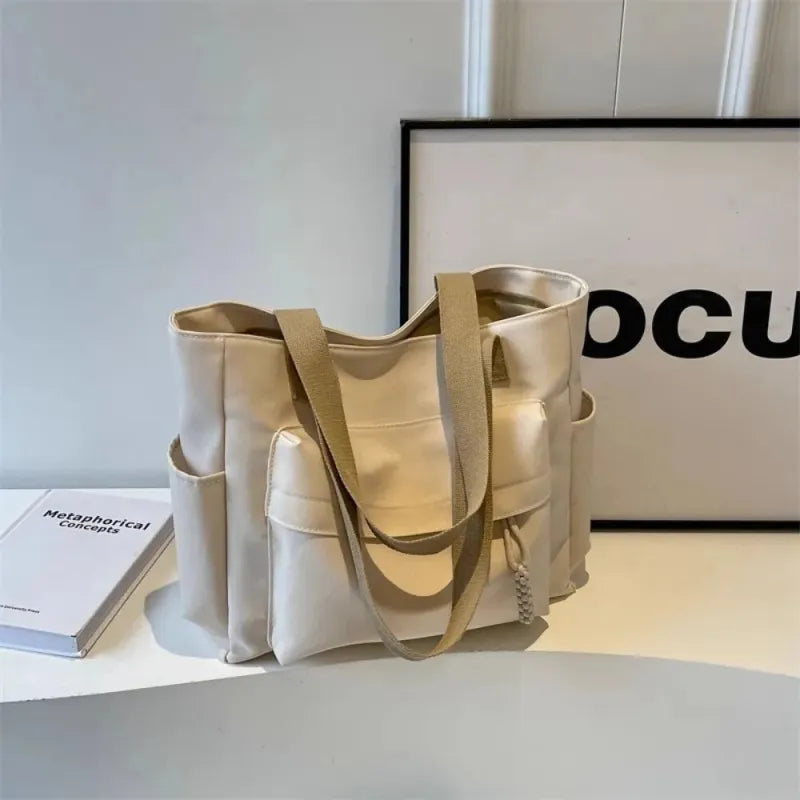 Grand sac à main cabas multipoches en toile Célestine