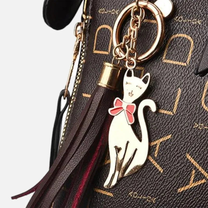 Sac à main bandoulière avec son charms chat doré Beatrice