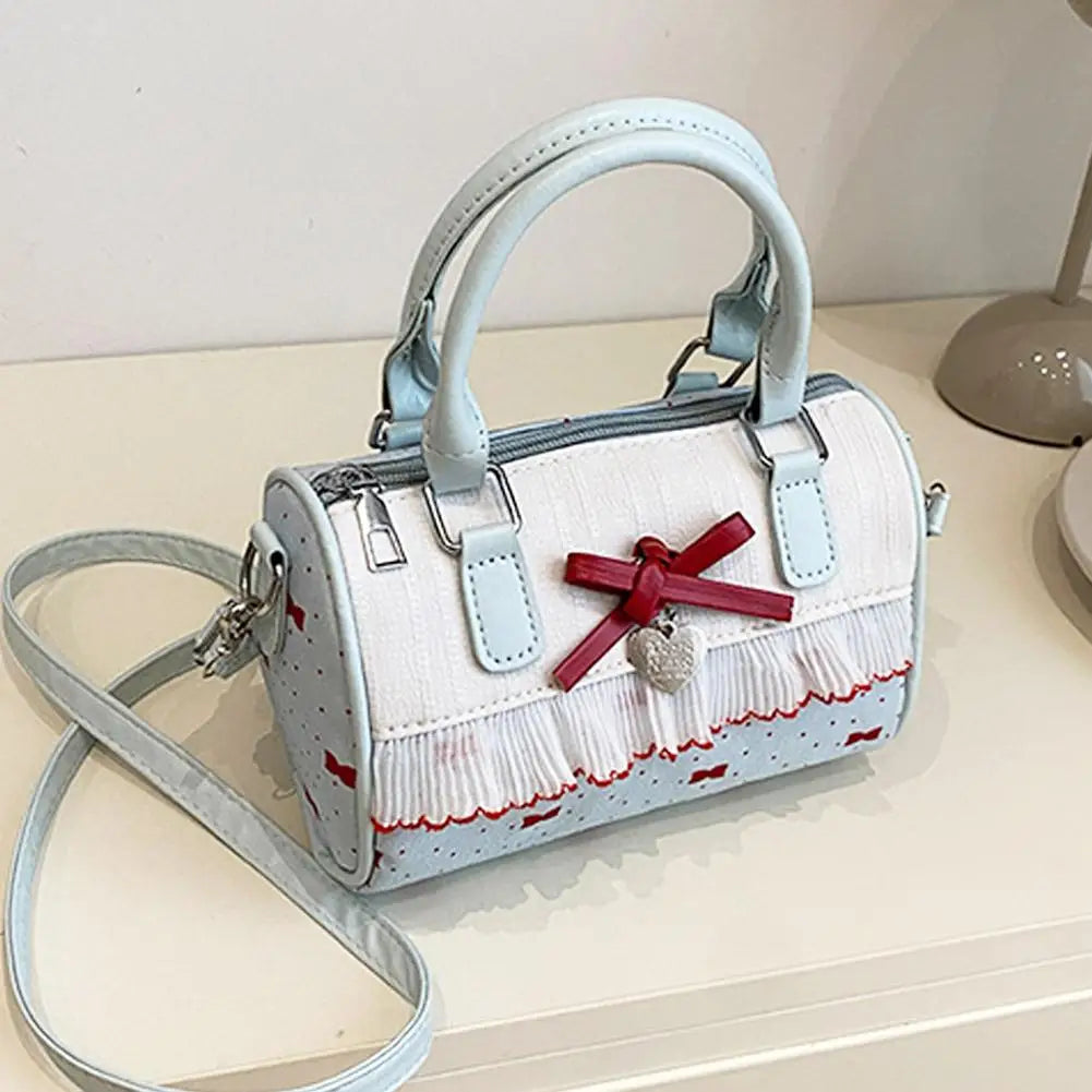 Petit sac à main bandoulière à pois au style rétro Agathe