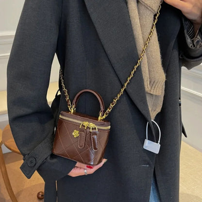 Petit sac à main bandoulière cubique matelassé au finition doré Aurore