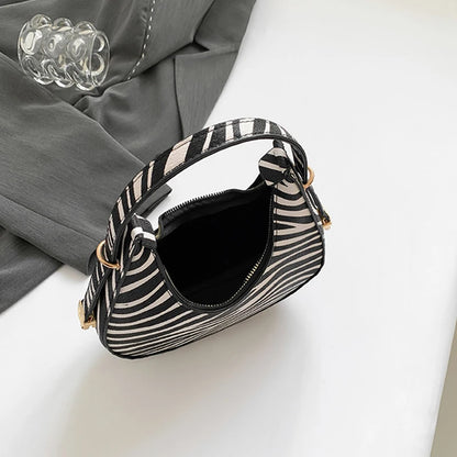 Petit sac à main bandoulière épaule motif animalier au design personnalisé et moderne Octavie