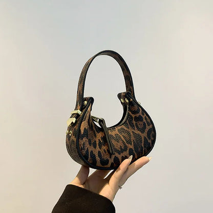 Petit sac à main bandoulière léopard au style Y2K et tendance Thaïs