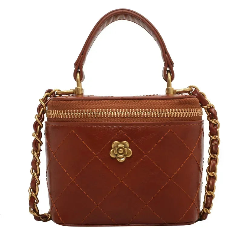 Petit sac à main bandoulière cubique matelassé au finition doré Aurore