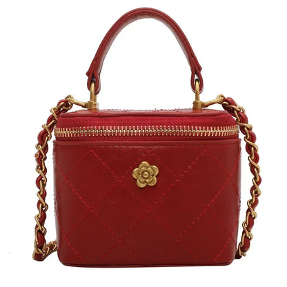 Petit sac à main bandoulière cubique matelassé au finition doré Aurore