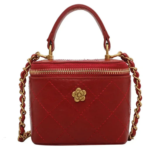 Petit sac à main bandoulière cubique matelassé au finition doré Aurore