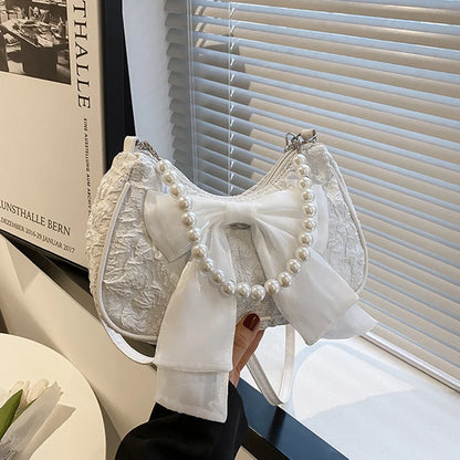 Petit sac à main bandoulière hobo en coton avec anse en perle et noeud décoratif Camille