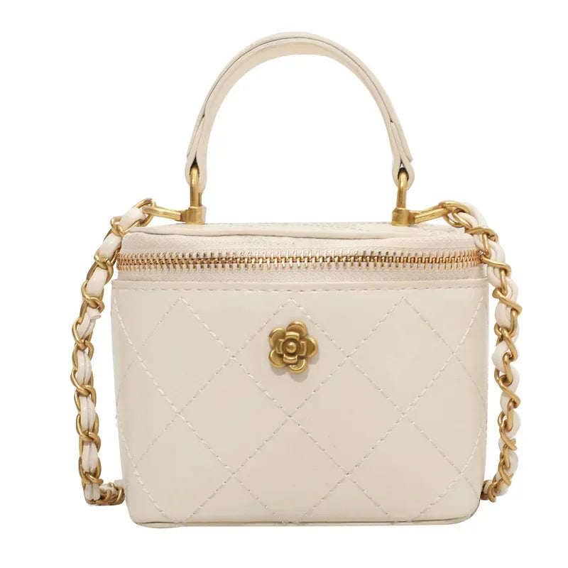 Petit sac à main bandoulière cubique matelassé au finition doré Aurore