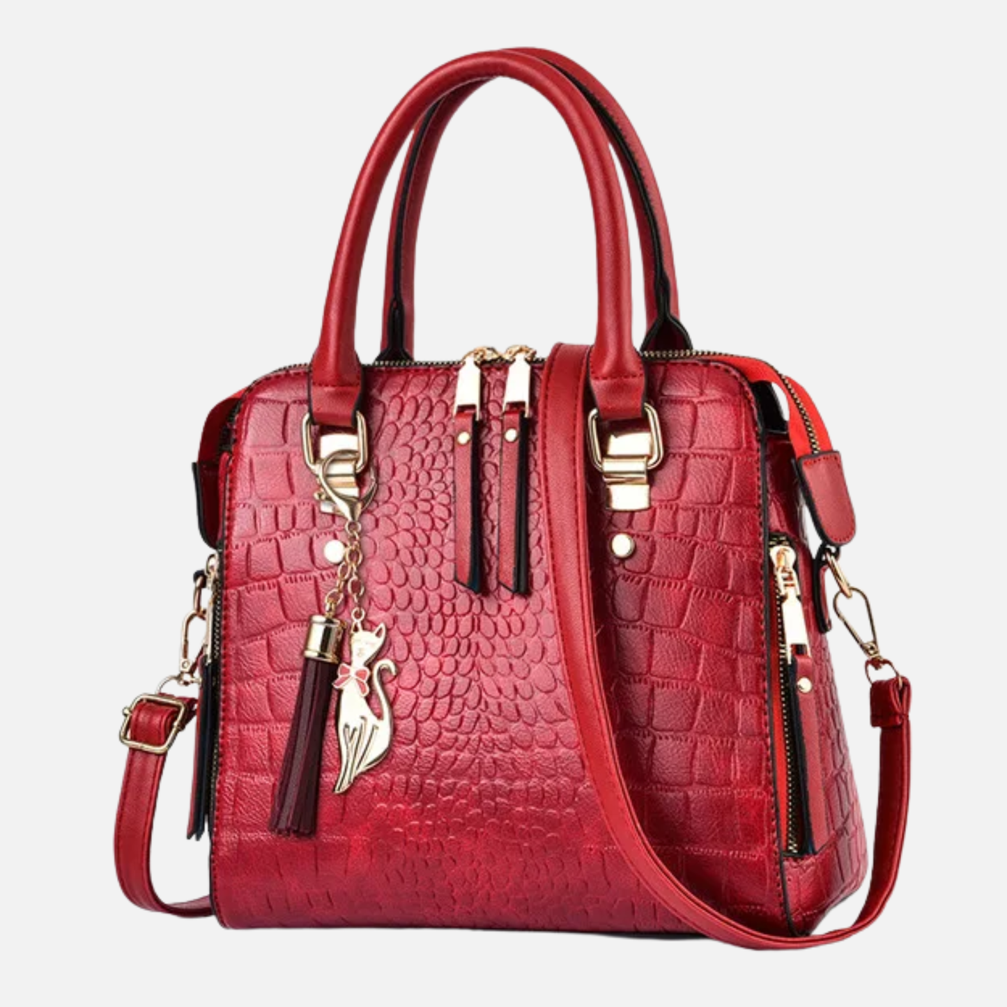 Sac à main bandoulière imitation croco avec son charms chat doré Sidonie