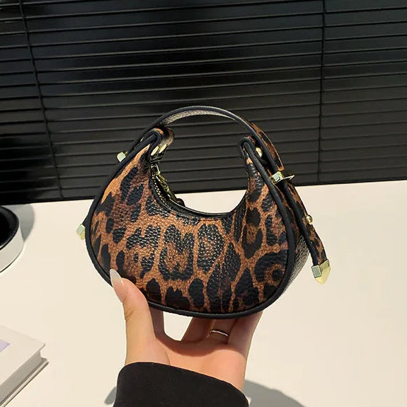 Petit sac à main bandoulière léopard au style Y2K et tendance Thaïs