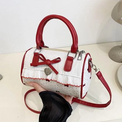 Petit sac à main bandoulière à pois au style rétro Agathe