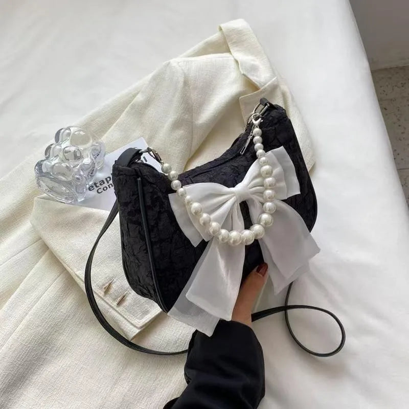 Petit sac à main bandoulière hobo en coton avec anse en perle et noeud décoratif Camille