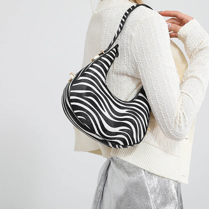 Petit sac à main bandoulière épaule motif animalier au design personnalisé et moderne Octavie