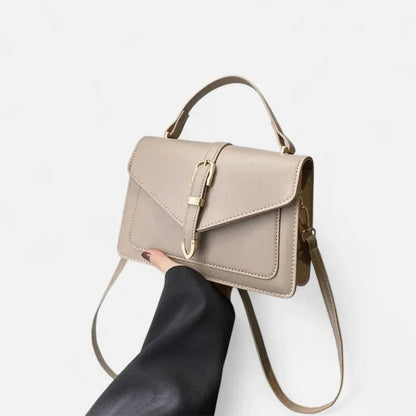 Petit sac à main bandoulière à rabat aux finitions doré Castille