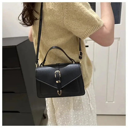 Petit sac à main bandoulière à rabat aux finitions doré Castille