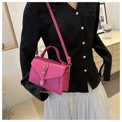 Petit sac à main bandoulière à rabat aux finitions doré Castille