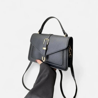 Petit sac à main bandoulière à rabat aux finitions doré Castille