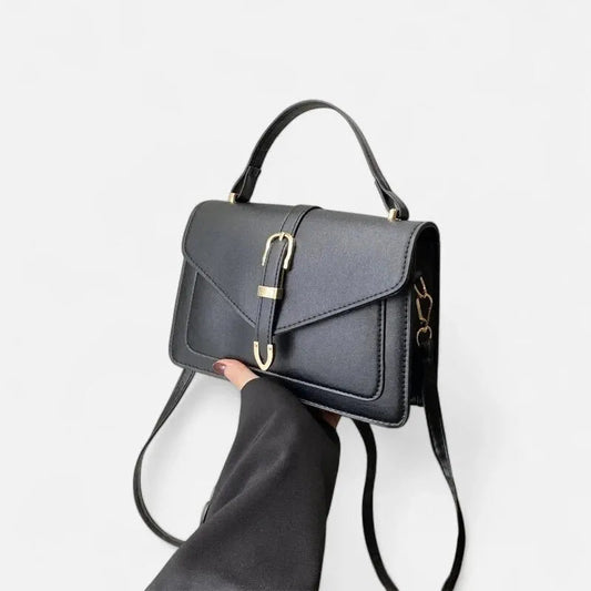 Petit sac à main bandoulière à rabat aux finitions doré Isaline