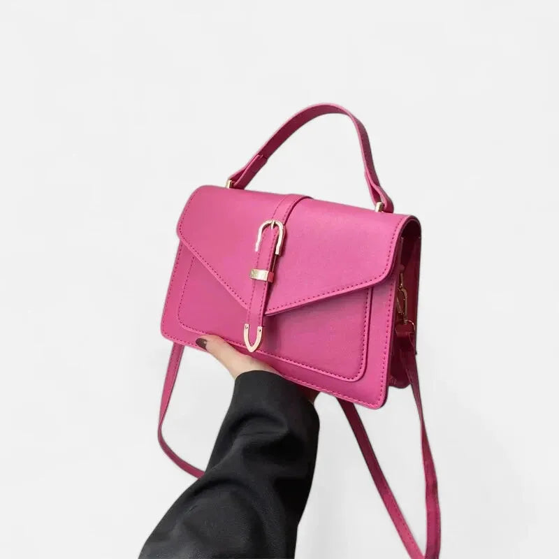 Petit sac à main bandoulière à rabat aux finitions doré Castille