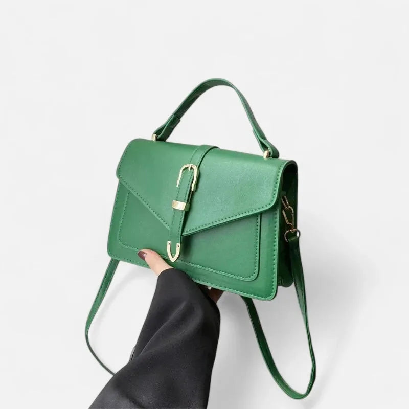 Petit sac à main bandoulière à rabat aux finitions doré Castille