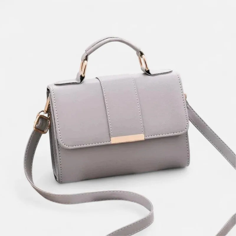 Petit sac à main bandoulière à rabat aux finitions doré Maëlys