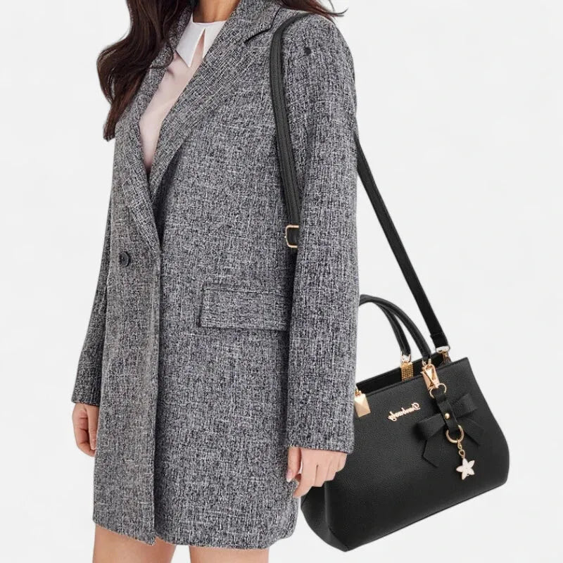 Petit sac à main bandoulière avec son charms noeud et fleur Léana