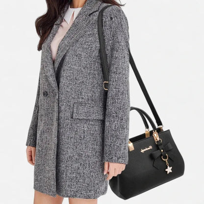 Petit sac à main bandoulière avec son charms noeud et fleur Léana