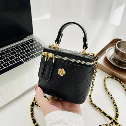 Petit sac à main bandoulière cubique matelassé au finition doré Aurore