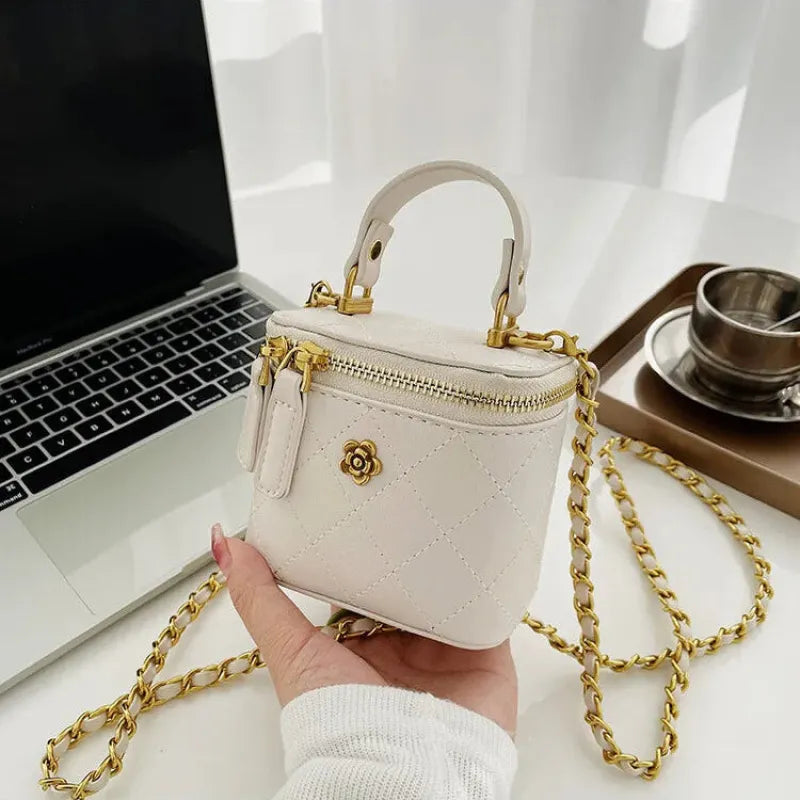 Petit sac à main bandoulière cubique matelassé au finition doré Aurore