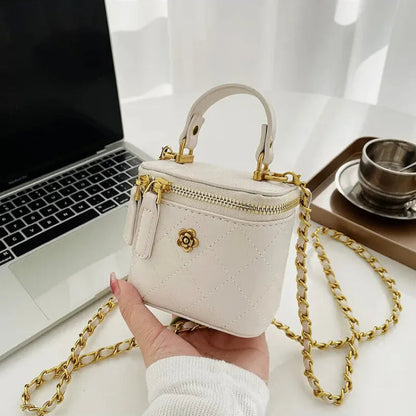 Petit sac à main bandoulière cubique matelassé au finition doré Aurore