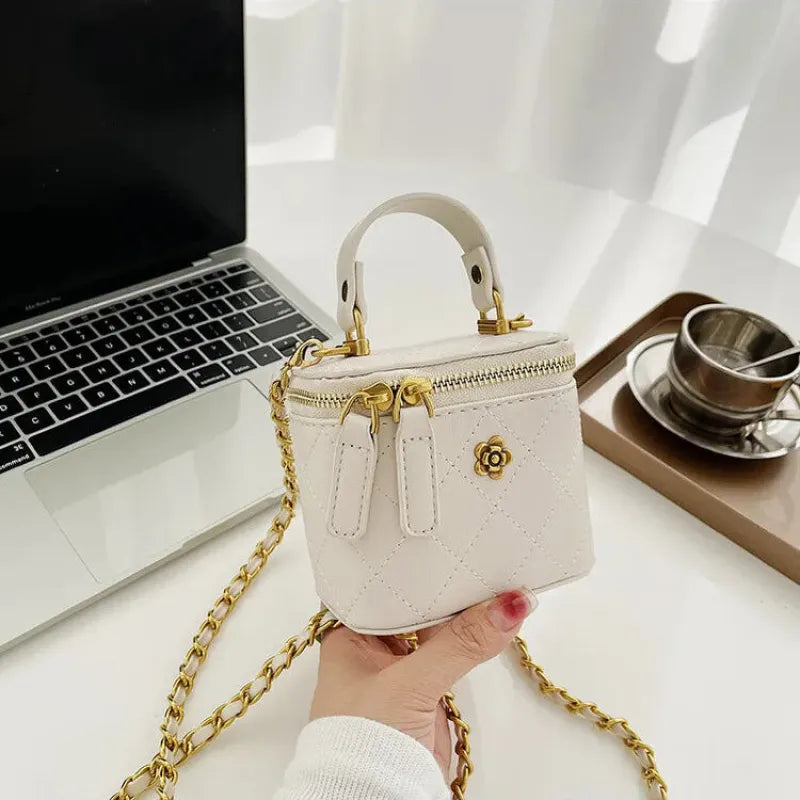 Petit sac à main bandoulière cubique matelassé au finition doré Aurore