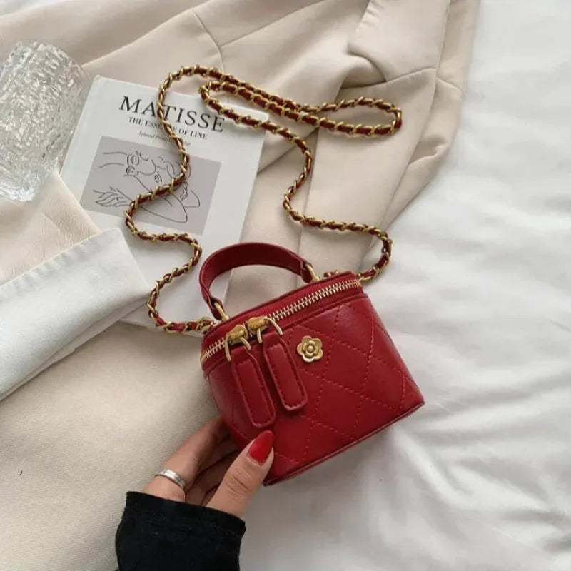 Petit sac à main bandoulière cubique matelassé au finition doré Aurore