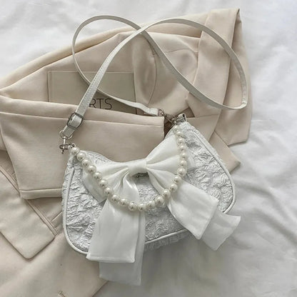 Petit sac à main bandoulière hobo en coton avec anse en perle et noeud décoratif Camille