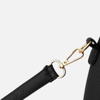 Sac à main bandoulière avec son charms doré assortie Ludovica