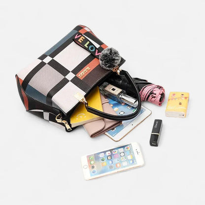 Sac à main bandoulière avec son charms pompon Isabella