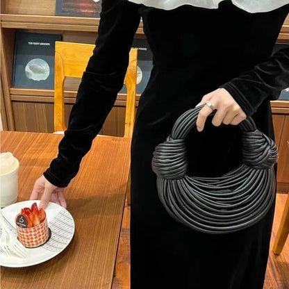 Sac à main bandoulière demi-lune tissé  Francesca