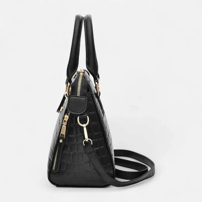 Sac à main bandoulière imitation croco avec son charms chat doré Sidonie