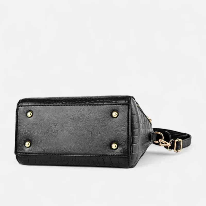 Sac à main bandoulière imitation croco avec son charms chat doré Sidonie