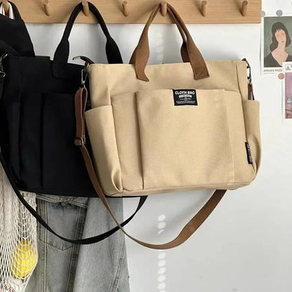 Sac à main cabas en toile multipoches à bandoulière Mia